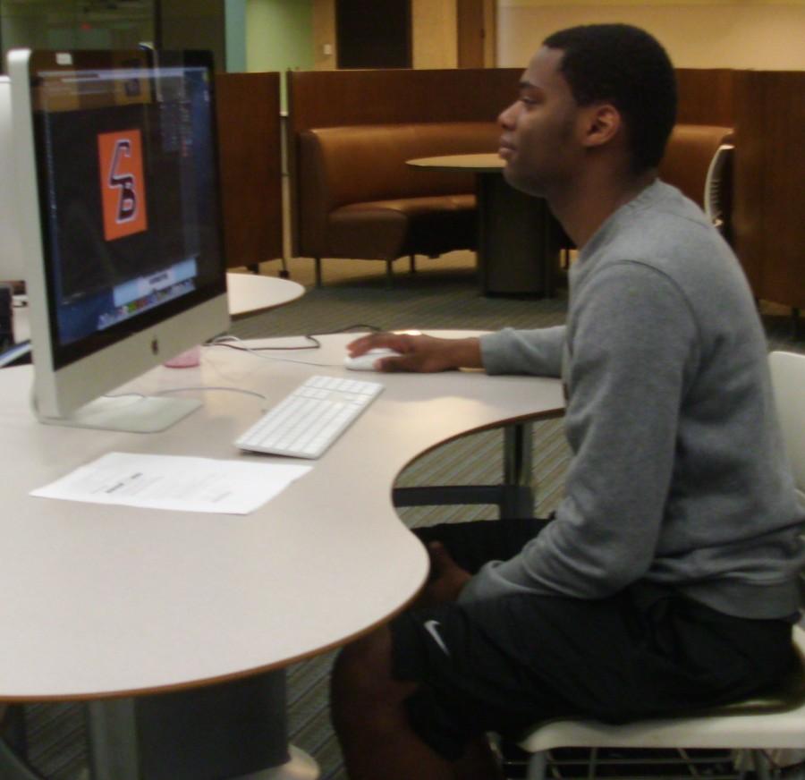 Charles Combest spends the day researching in Bierce Library.