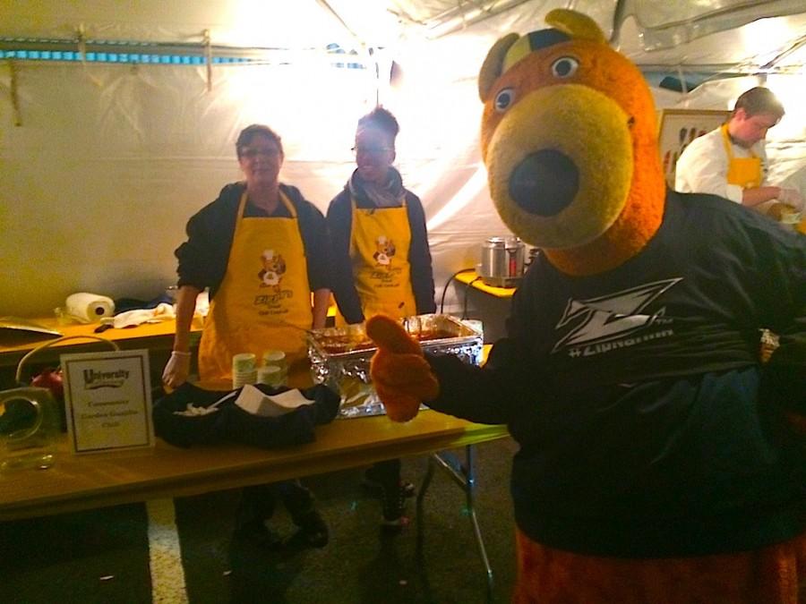 Zippy poses with Dining Services and their  secret chili recipe made by Matthew Regula