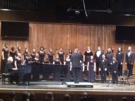 Bryan E. Nichols conducts the choir