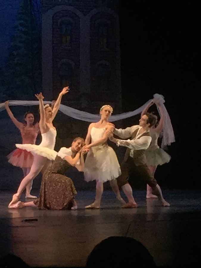 The cast of the Russian fairy tale The Snow Maiden performing on stage at EJ Thomas Hall on Sunday. 