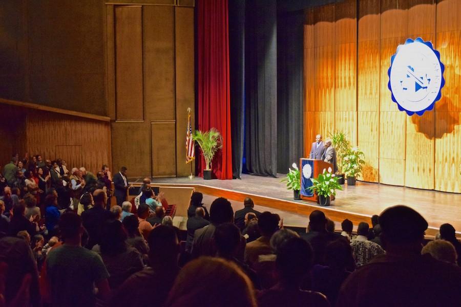 The audience gave Michael Dyson a standing ovation at the conclusion of his speech about the stereotyping of black males. 