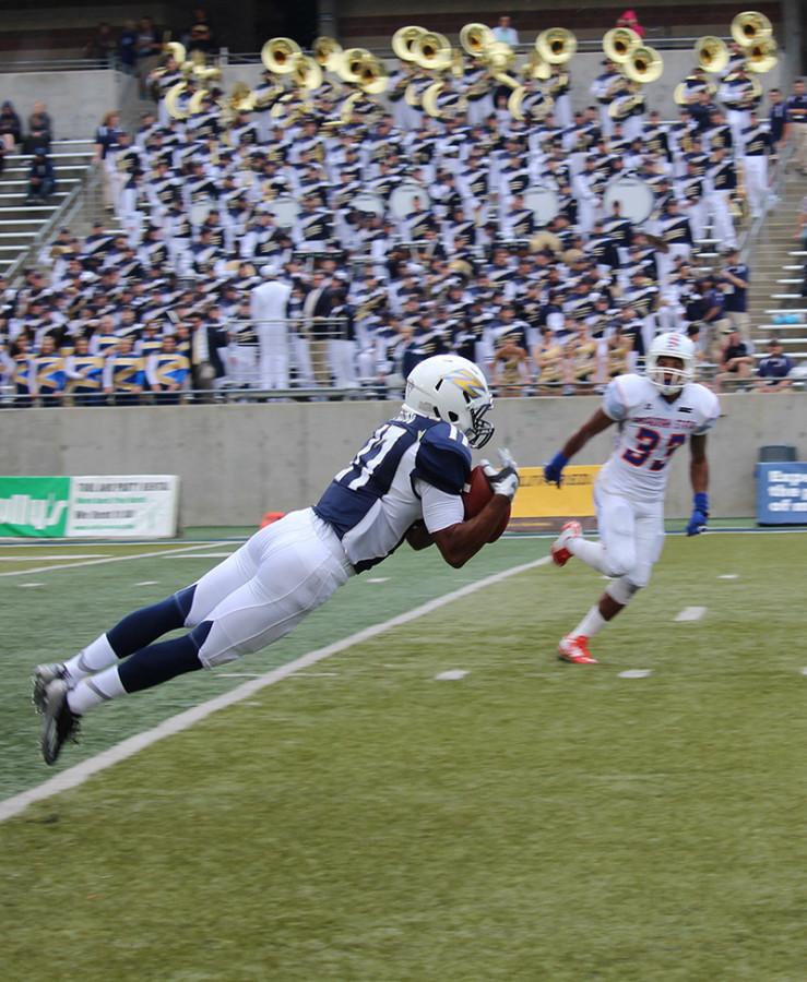 Anthony Young dives for another reception.