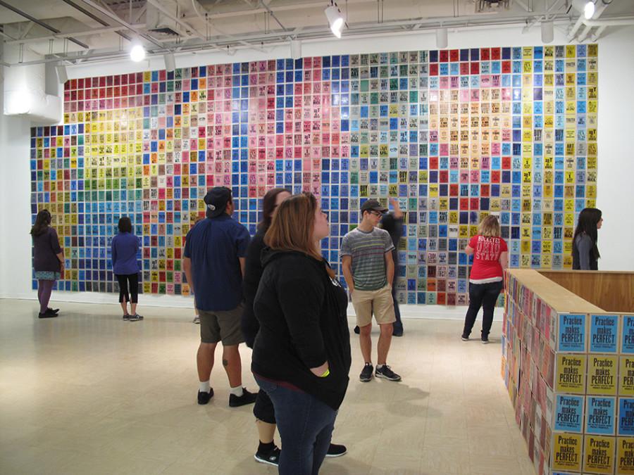Visitors look at installation at Folk Hall by artist Kennedy.