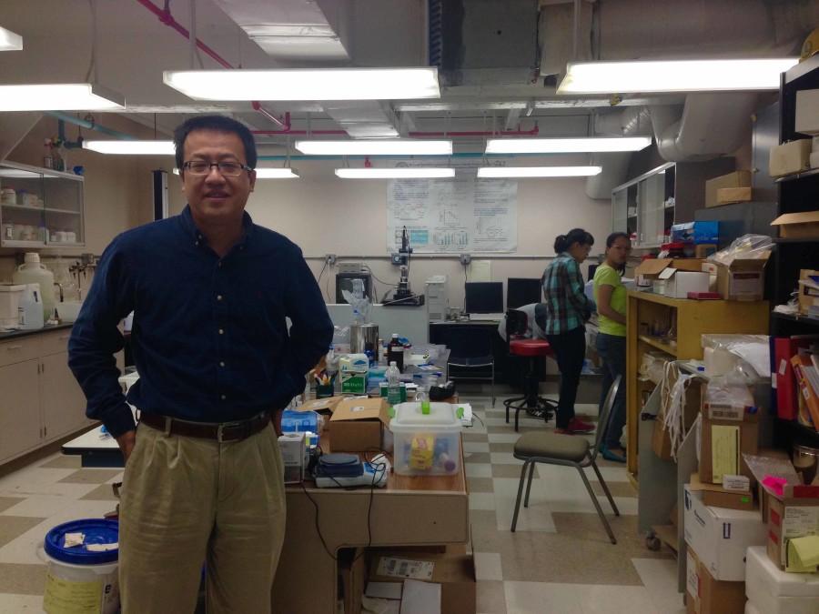 Associate professor of chemical and bimolecular engineering, Jie Zheng, in his lab at Whitby Hall.