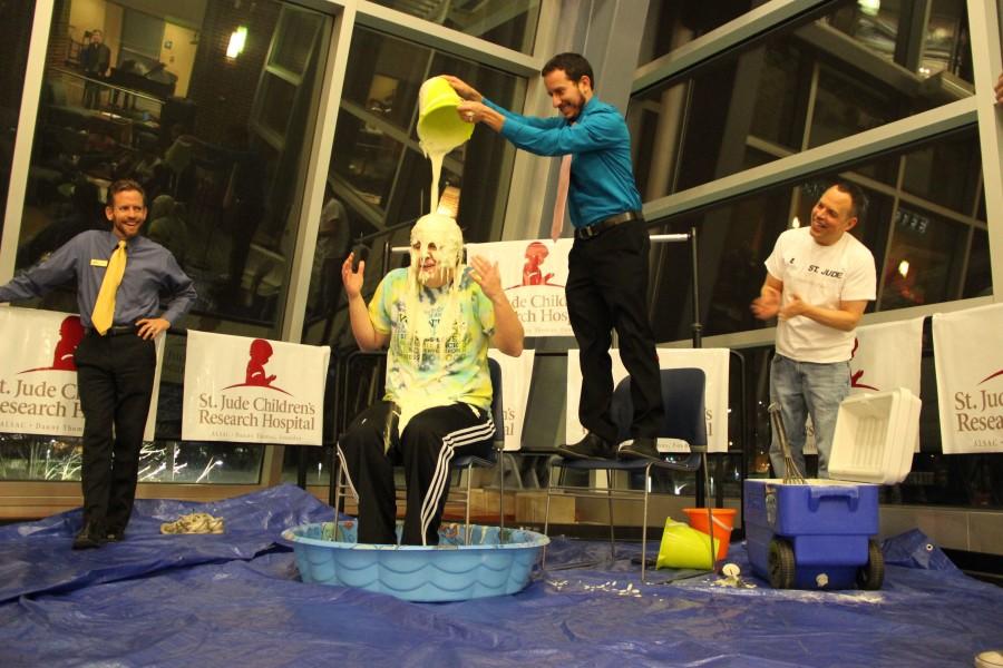 John Messina is slimed during the event by Zac Steiner.