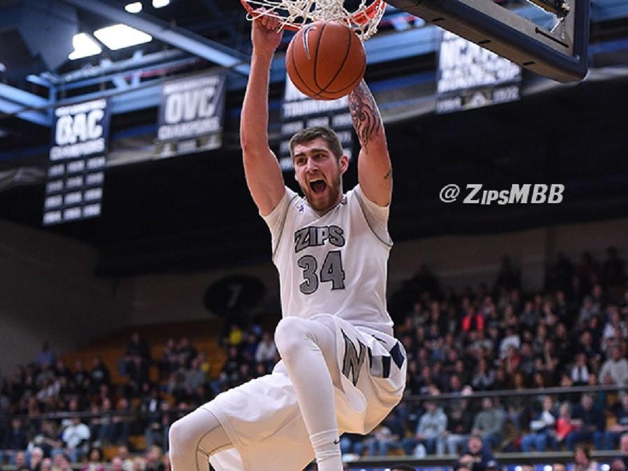Pat Forsythe slams home two of his 20 points against Marshall. 