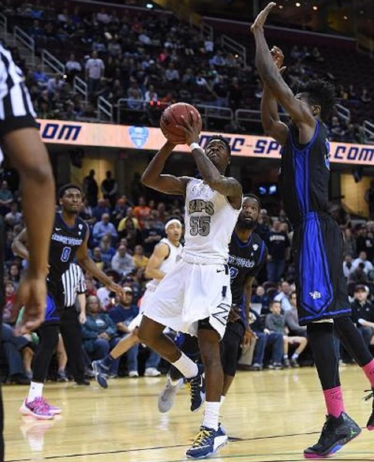 Antino Jackson drives for two of his 14 points in the MAC Championship game