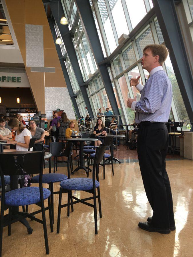 Interim President Wilson talks to students during the Town Hall meeting at Starbucks on Sept. 7. 