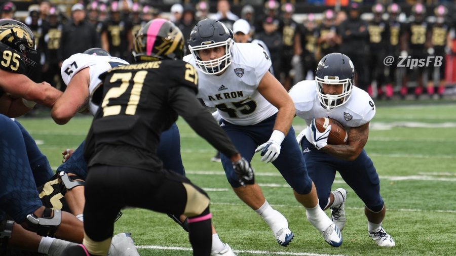 Akron’s Brandon Junk moves to block for Manny Morgan during their win over Western Michigan. (Photo courtesy of Akron Athletics)
