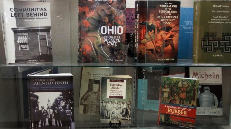 Various books written by UA History professors on display on the second floor of the Buchtel College of Arts and Sciences.