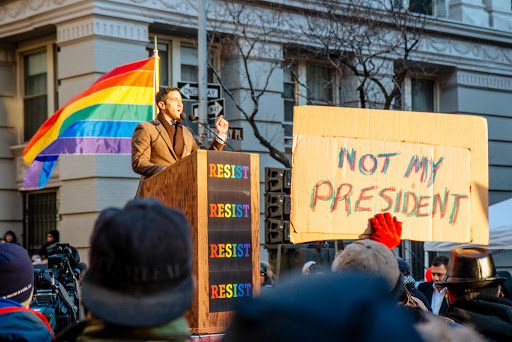 LGBT Solidarity Rally in front of the Stonewall Inn in solidarity with every immigrant, asylum seeker, refugee and every person impacted by Donald Trumps illegal, immoral, unconstitutional and un-American executive orders. (Image via Flickr)