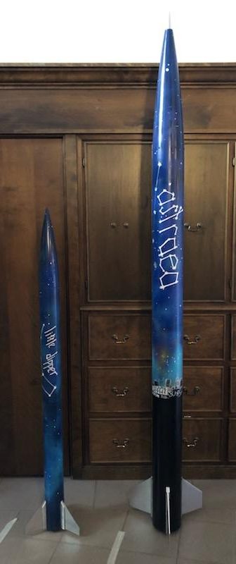 The Akronauts’ preliminary design, named Astraea (right), will reach heights of 4,900 feet. The team worked with Mac Love at Art X Love in Akron to have a custom paint job that will capture the essence of the rocket, the Akronauts and the city of Akron. The smaller rocket on the left, named Little Dipper, was the team’s subscale test rocket.