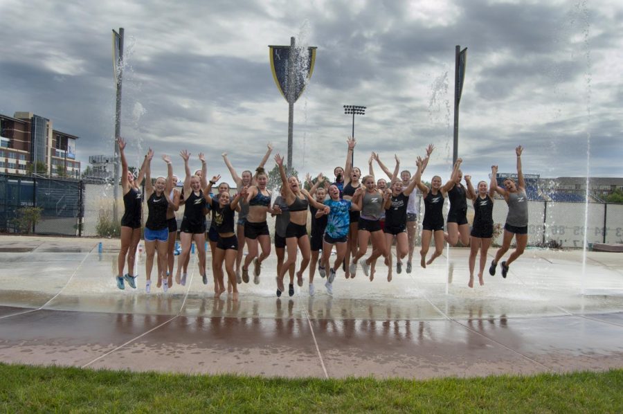 Jumping for joy, these UA student athletes cooled off after a fun Friday practice.