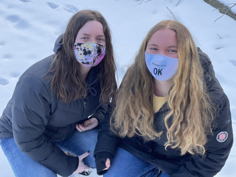 Roommates Tina Grassi and Madi Britton, both third-year engineering students at the University of Akron, have some masked fun in the snow.  
