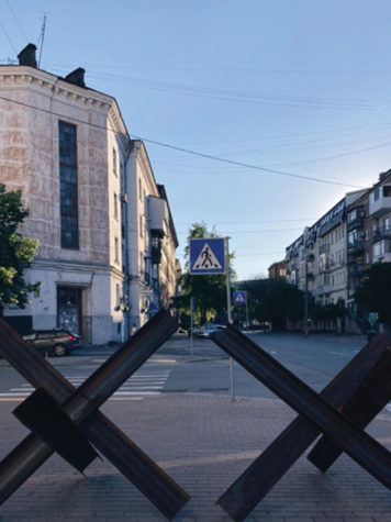 Large metal barricades called "hedgehogs" on a street in Kyiv